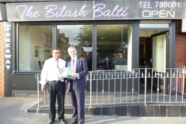 Azizul Choudhury  with Mark Menzies MP on the Bilash being named best Indian restaurant in the North West in the Tiffin Cup