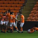 An Arnold Matshazi double and a Jake Daniels strike sealed Blackpool's progress through to the last eight