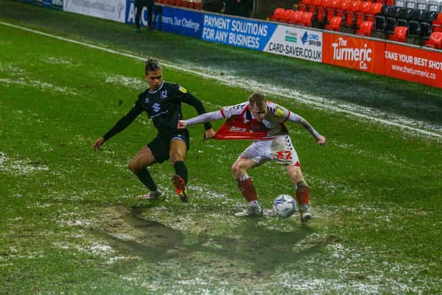 Paddy Lane managed to show his skills against MK Dons despite the saturated surface at Highbury
Picture: SAM FIELDING / PRIME MEDIA IMAGES
