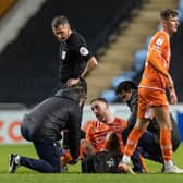 Keogh receives treatment at Coventry on Tuesday night