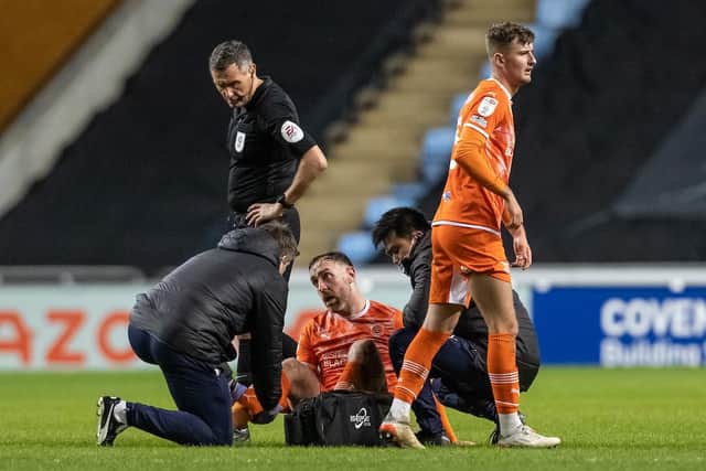 Keogh receives treatment at Coventry on Tuesday night