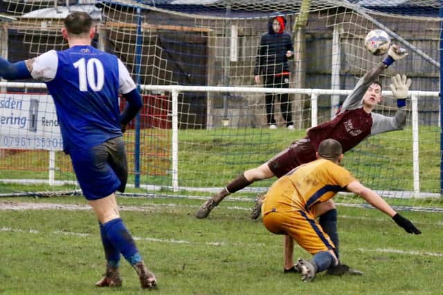 Dean Ing forces the Winsford keeper into a diving save
Picture: IAN MOORE
