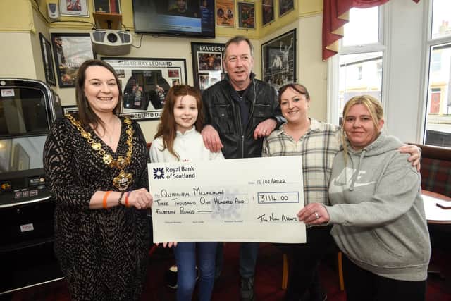 Quiarnah McLachlan is given a cheque for over £3000 raised at The New Albert Pub and Sports Bar. She is pictured with Blackpool mayor Amy Cross, Mike and Talia Garrod and general manager Lianne Evans.