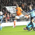 Nathan Delfouneso scores the second of his two goals