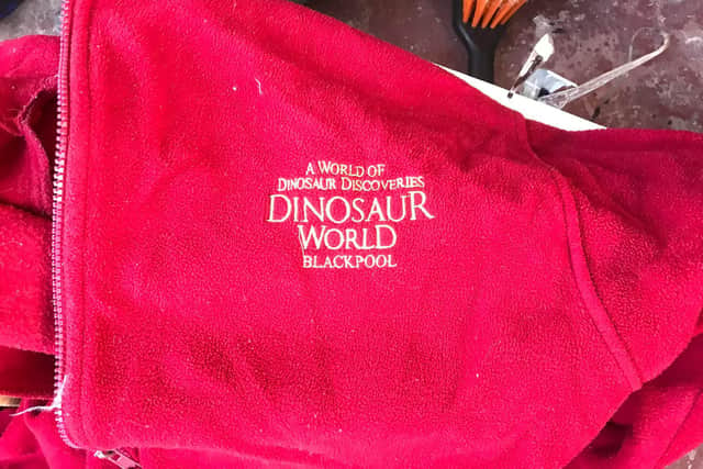 A distinctive red fleece carrying the logo of a former Blackpool visitor attraction had been placed inside the bag alongside the cat Belvedere found on Highfield Road in South Shore
