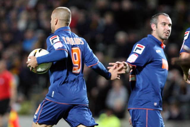 Gary Taylor-Fletcher congratulates Kevin Phillips on scoring Picture: Dan Westwell