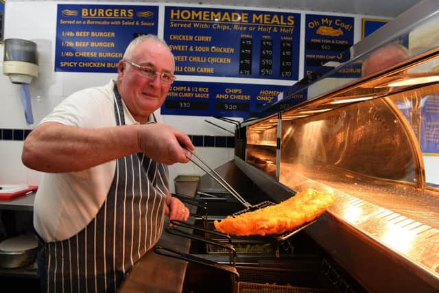 John Clarkson frying fish at Mr Eaters in Ribbleton, Preston