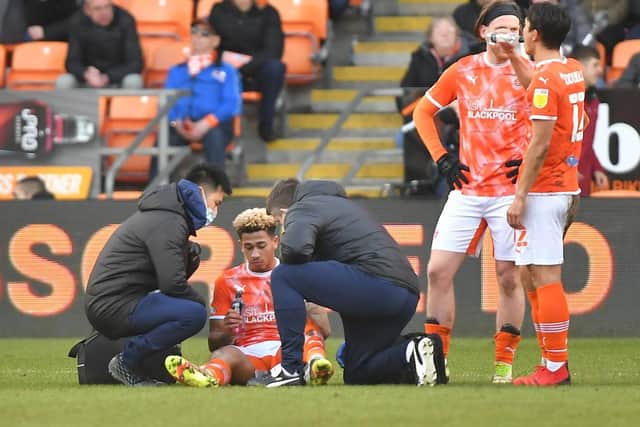 Gabriel receives treatment during yesterday's win against Reading