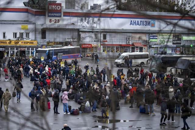 People fleeing from Russian bombs in Ukraine