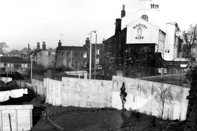 The Rock Inn public house at the junction of Whitecote Lane (through the centre of the photo) with Leeds and Bradford Road (off the picture on the right). The area in the foreground is soon to be developed into Well Garth Bank.