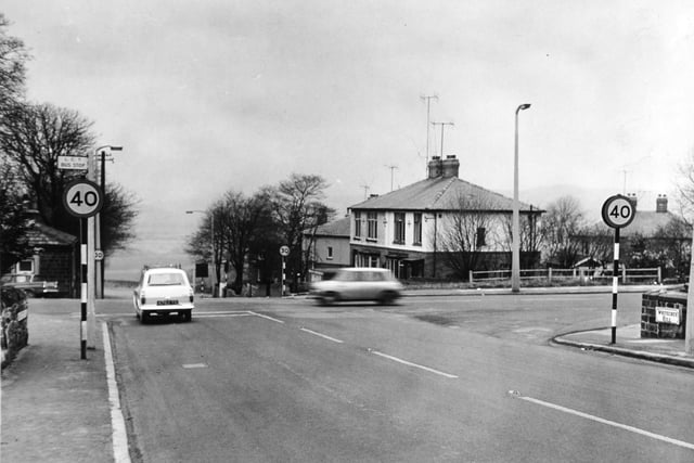 The Rodley Lane and Whitecote Hill crossing on Leeds and Bradford Road in February 1965.