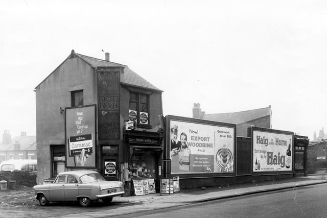 Partially demolished row of properties in Lower Town Street in February 1960. Far left is Thompson's newsagents and far right is  Steve Miller, High Class Shoe Repairs.