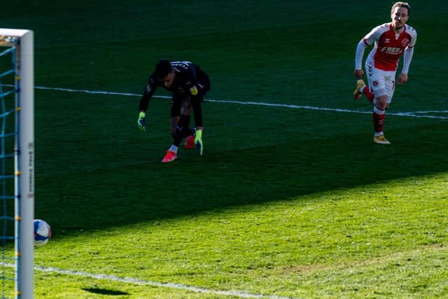 Barrie McKay capitalises on keeper Nikola Tzanev's error to seal victory for Fleetwood at Wimbledon