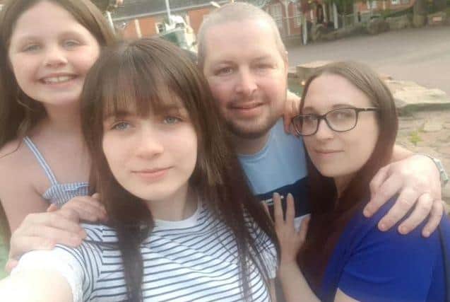 Chris Peachey, with daughter Daisy, 11, stepdaughter Leah, 18, and wife Lisa. Photo: Lisa Peachey