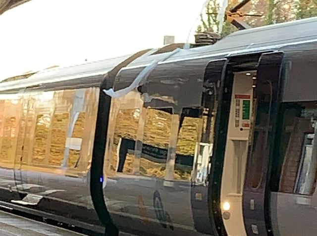 The train at Poulton with plastic ribbon attached to the pantograph