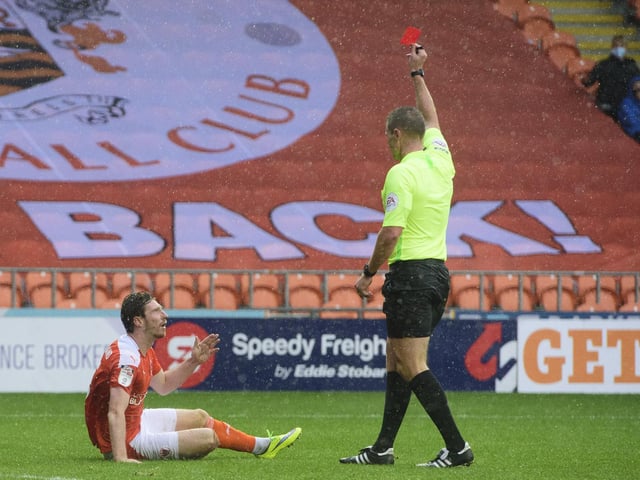 James Husband was sent off during the game with Lincoln City at Bloomfield Road
