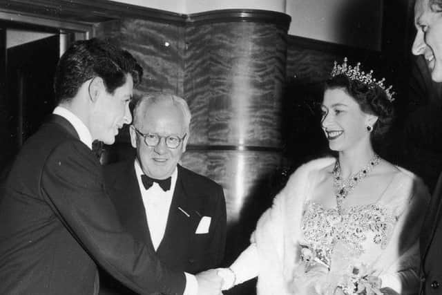 The Duke of Edinburgh and The Queen meet American star Eddie Fisher (left) at the Opera House in 1955. Getty images