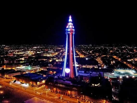 The Tower lit up red, white, and blue on Friday, April 9, 2021 following the death of His Royal Highness Prince Philip, the Duke of Edinburgh (Picture: Dave Nelson)