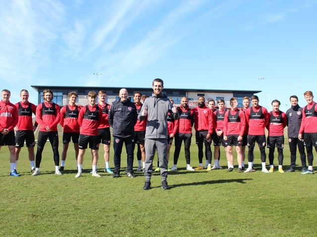 Fleetwood 'superfan' George McLaughlin visited the club's training ground in Thornton on Friday, April 9, 2021, after being released from hospital, where he spent more than six months after being seriously hurt in a crash between his bike and a Ford Transit Tipper in Broadway, Fleetwood, shortly before 4pm on Thursday, August 22, 2020 (Picture: FTFC)