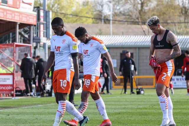 Blackpool's players let a two-goal lead slip at Lincoln City on Saturday