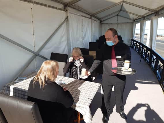 Coffee is served in the marquee at the front of Fleetwood's North Euston Hotel