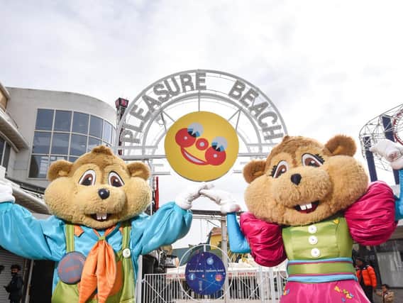 Mr Funshine is back for the 125th season of Blackpool Pleasure Beach.  Pictured are Bradley and Bella Beaver.
