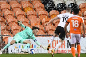 Blackpool keeper Chris Maxwell makes his midweek penalty save