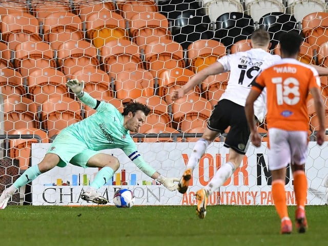 Blackpool keeper Chris Maxwell makes his midweek penalty save