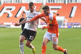 Elliot Embleton is ineligible to feature for Blackpool today