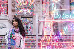 Chila Kumari Burman with her work for the Winter Commission at the Tate Phot by Joe Humphrys
