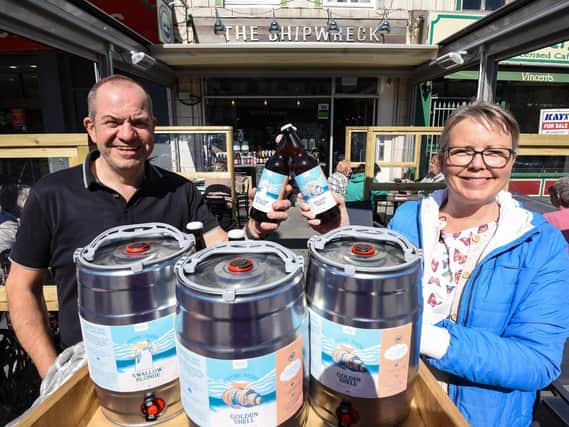 Shipwreck Brewhouse owner Paul Samson with Jane Littlewood, of Care for Cleveleys