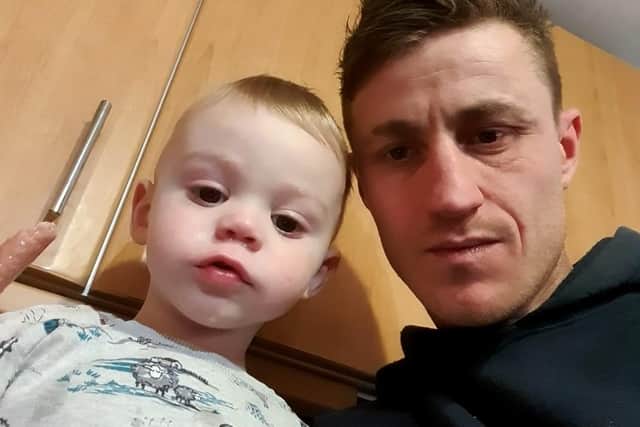 Danny Wise with his two-year-old son Harry