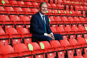 Labour Leader Keir Starmer sits in social distanced seating during a visit of Walsall Football Club on September 19, 2020 in Walsall, England.