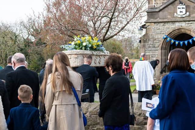 People wore blue and lined the streets of Bilborrow to remember him