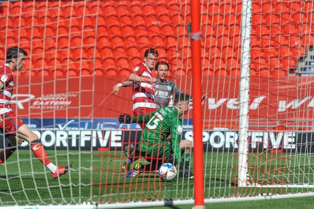 Barie McKay scores for Fleetwood at Doncaster