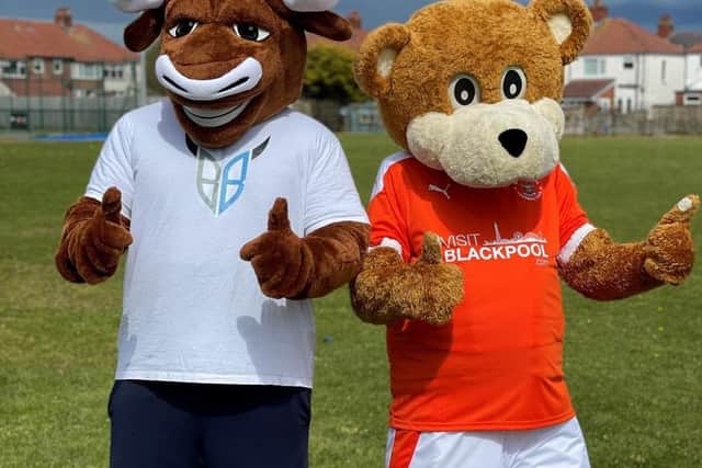 Highfield's mascot Bill the Bull, with Blackpool FC's mascot Bloomfield Bear.