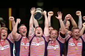 Fylde's Adam Lewis lifting the Bill Beaumont Cup as Lancashire captain at Twickenham in 2016