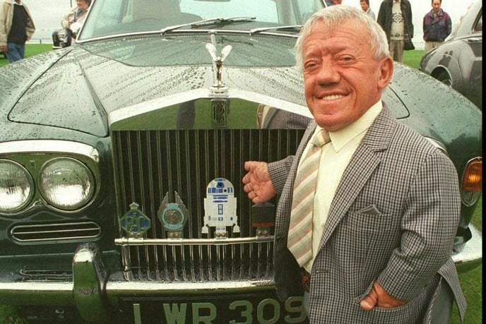 Star Wars actor Kenny Baker with his Rolls Royce at the Rolls Royce and Bentley Motor Car Rally held on Lytham Green in 1999
