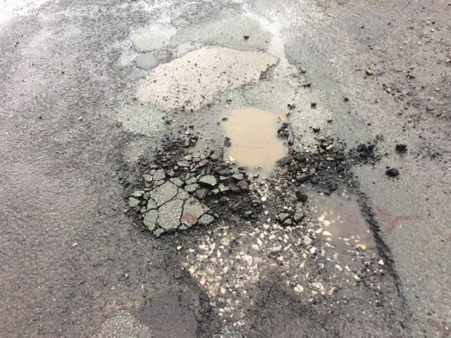 A section of crumbling carriageway on Daffodil Close in Helmshore (image: Dave Carter)