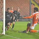 Andy Butler can't stop Ellis Simms from scoring his second goal of the night