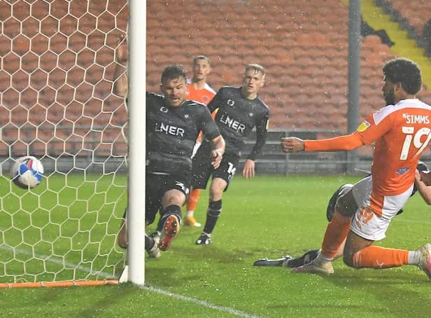 Andy Butler can't stop Ellis Simms from scoring his second goal of the night