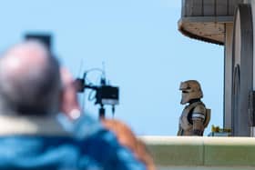 The Empire has arrived! Stormtroopers have been spotted outside Cafe Cove, which appears to have been transformed into a makeshift marketplace, with props used as stalls.