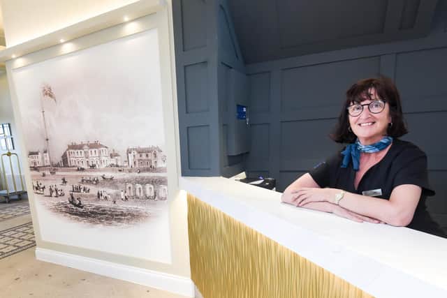 Judith Woodbridge behind the new-look reception desk