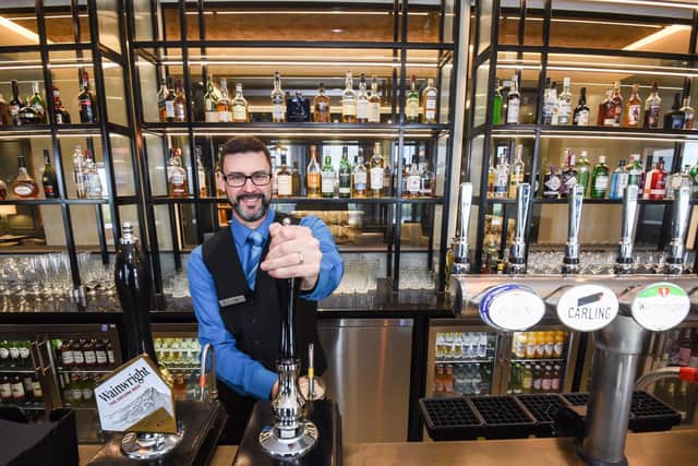 Mike Smith behind the revamped hotel bar