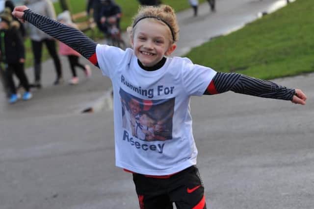 Jordan Banks, nine, died after being struck by lightning on May 11. Pictured here running a marathon in Stanley Park to raise money for a mental health charity