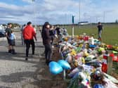 Flowers, footballs, balloons and cards left at Common Edge playing fields in memory of Jordan Banks