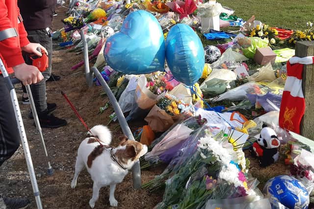 Flowers, footballs, balloons and cards left at Common Edge playing fields in memory of Jordan Banks