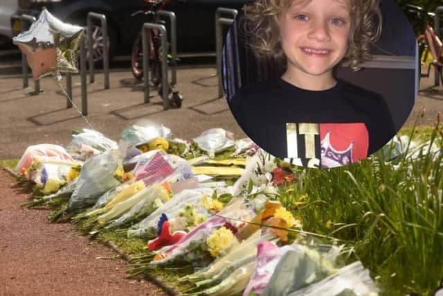 Wellwishers have today laid flowers and cards outside Stanley Primary School