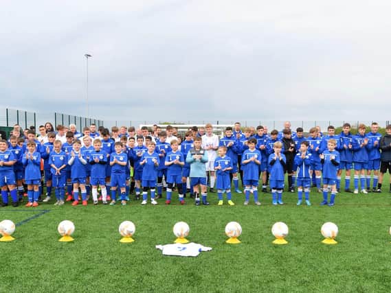 The BJFF players pay tribute to youngster Jordan Banks (Picture by Dave Nelson)