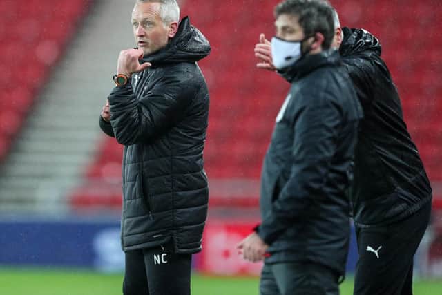 Neil Critchley takes his Blackpool squad into play-off action tomorrow